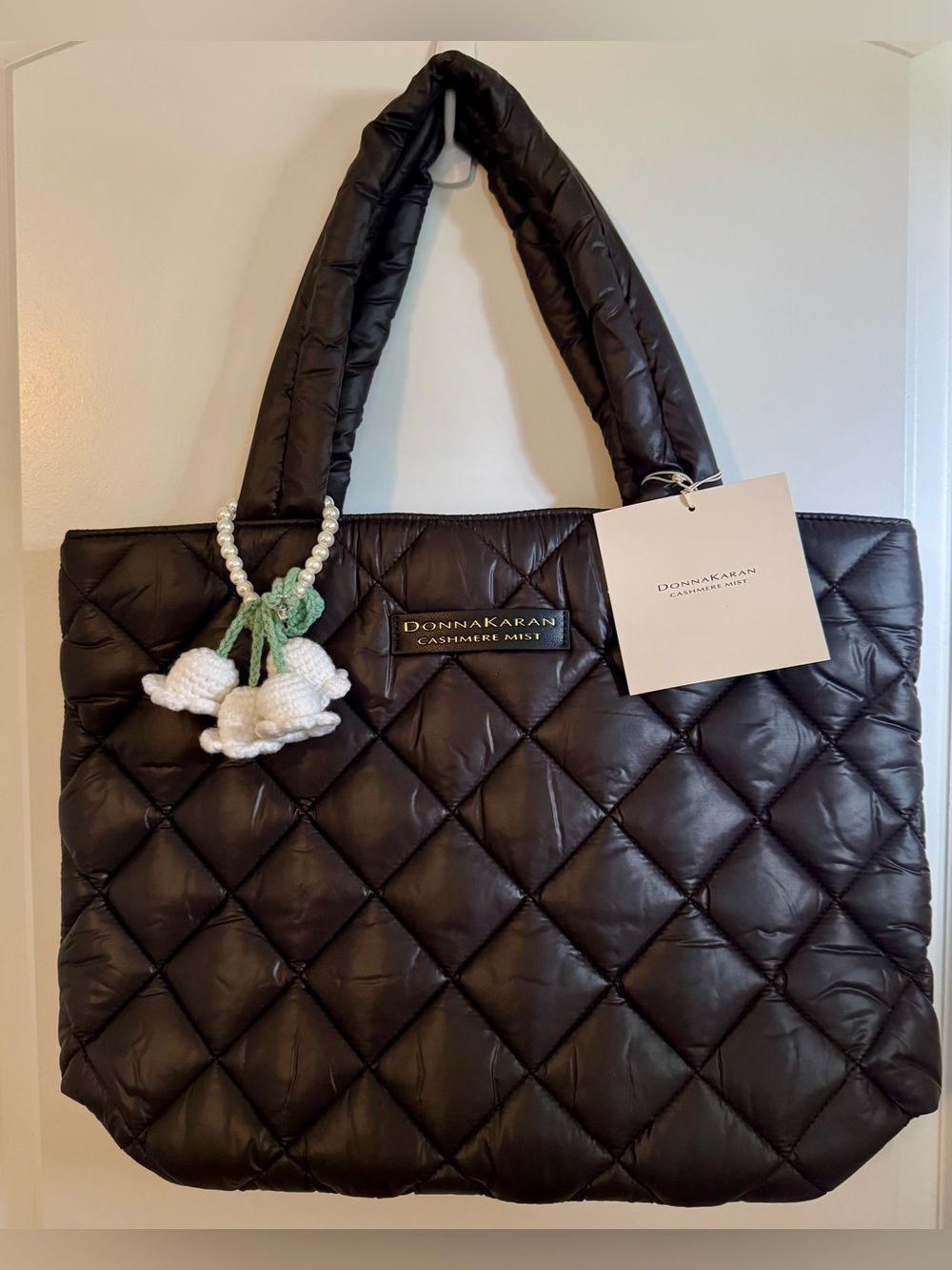 Donna Karan Cashmere Mist Quilted Black Tote with Pearl Flower Charm